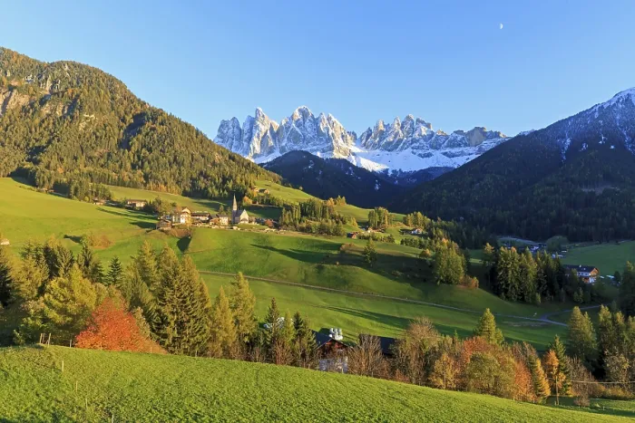 Framed Print : Idyllic landscape with village surrounded by meadows and a mountain panorama Framed Print : Idyllic landscape with village surrounded by meadows and a mountain panorama