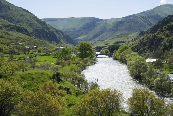 Framed Print : Idyllic valley with a flowing river