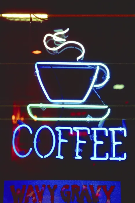 Framed Print : Illuminated advertising at a coffee shop