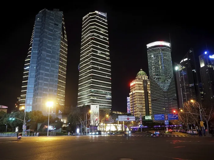 Framed Print : Illuminated skyscrapers in a modern city at night