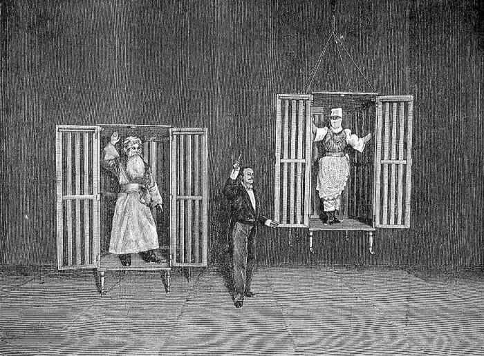 Framed Print : The illusionist Thorn demonstrates the appearance and disappearance of persons in cages