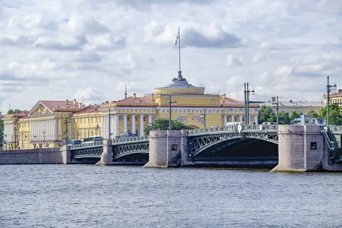 Framed Print : Impressive bridge over a river with historic buildings in the background Framed Print : Impressive bridge over a river with historic buildings in the background