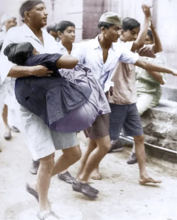 Framed Print : Injured woman being carried by man during Quit India movement, India, Asia, August 1942, Asia