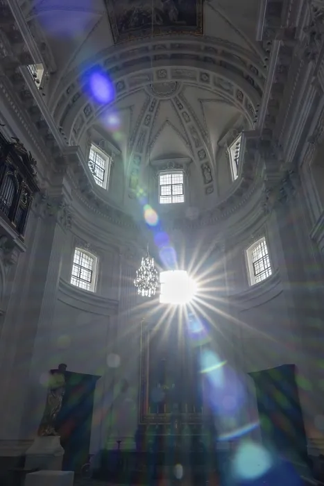 Framed Print : Inside The Beautiful Baroque Cathedral St Ursus with Sunlight and Lens Flare in a Sunny Day in Solothurn