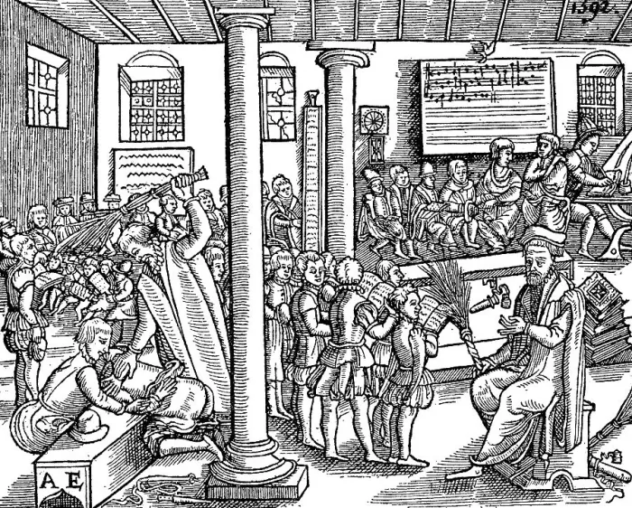 Framed Print : Inside a school, The boys sit or stand in individual circles and receive instruction in reading