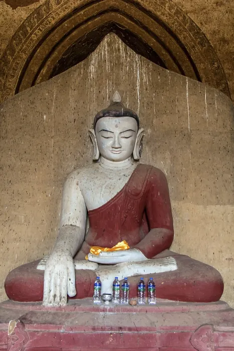 Framed Print : The interior of Buddhist Temple with statue of sitting Buddha
