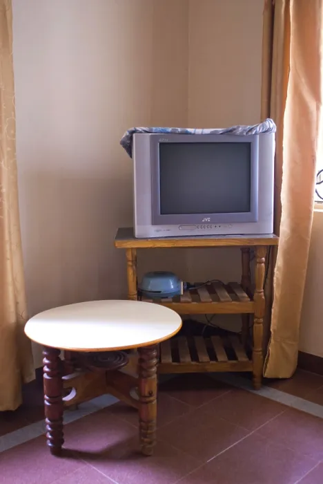 Framed Print : Interior of hotel with television and table Framed Print : Interior of hotel with television and table