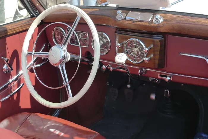 Framed Print : Interior view of a classic car with wooden details and retro dashboard