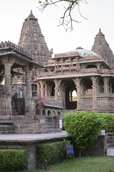 Framed Print : Intricate stone temple architecture in an evening setting with surrounding greenery