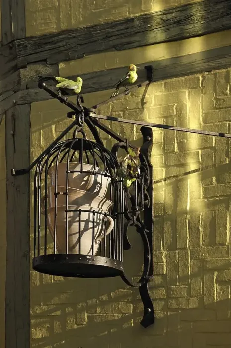 Framed Print : Iron birdcage with coffee cups from Cafe Finkenherd