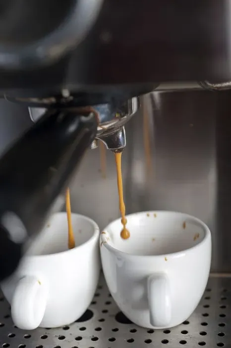 Framed Print : Italian espresso coffe making with professional machine macro