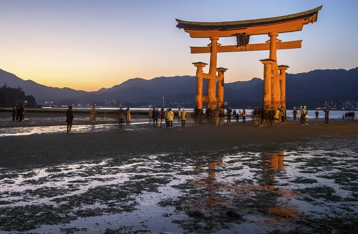 Framed Print : Itsukushima Shrine, Torii Gate at low tide at sunset