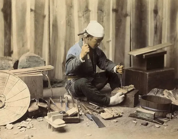 Framed Print : Japanese Shoemaker at Work, 1890 Framed Print : Japanese Shoemaker at Work, 1890