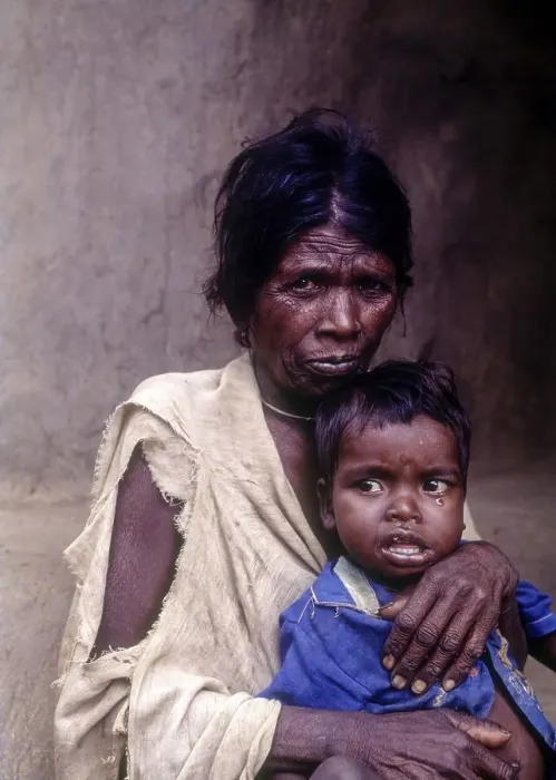 Framed Print : Jenu Kurumba tribal with son at Nagarhole