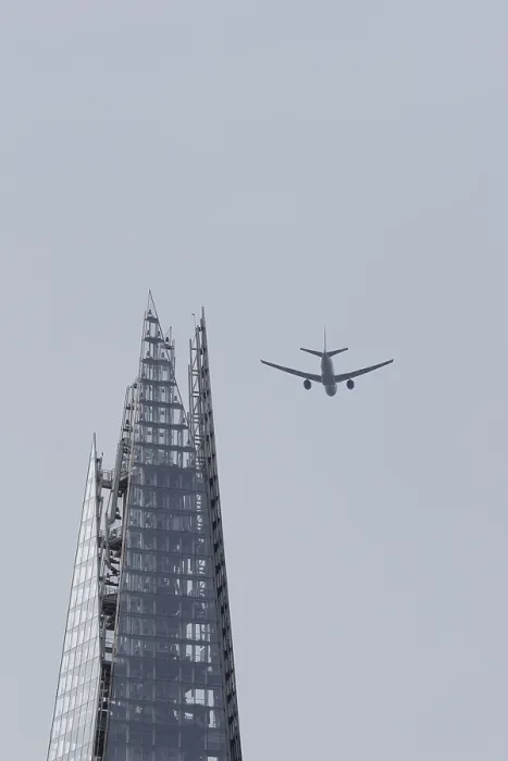 Framed Print : Jet passenger aircraft in flight over The Shard skyscraper building
