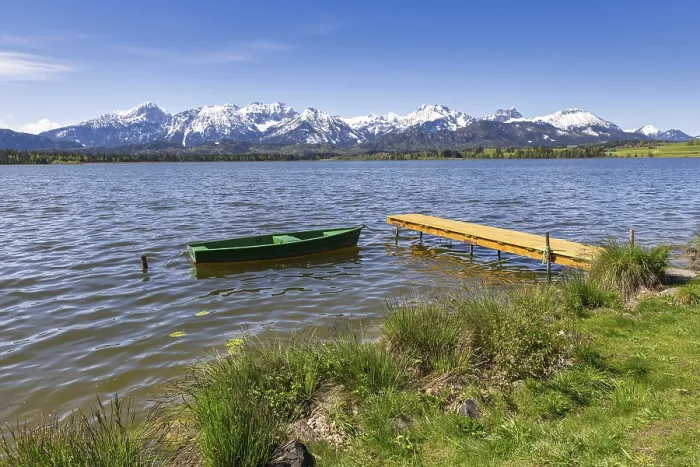 Framed Print : Jetty with boat on Lake Hopfensee