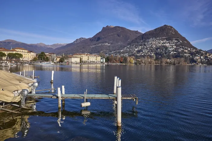 Framed Print : Jetty, motorboat, lake, hill, village