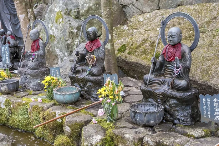 Framed Print : Jizo statues with prayer beads and red scarves in Japan