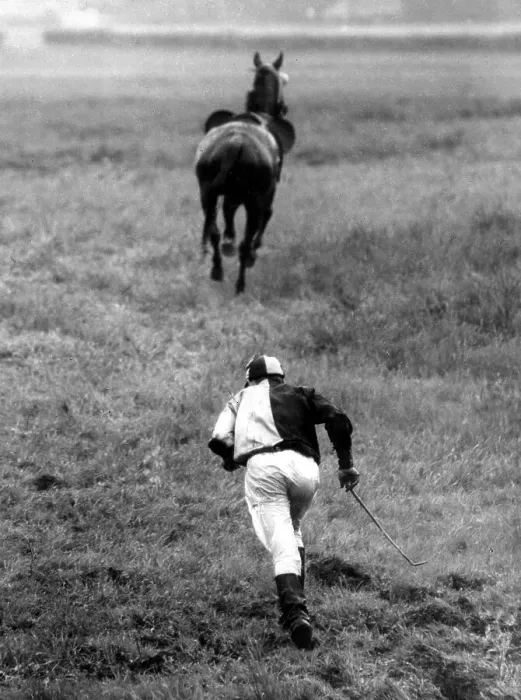 Framed Print : Jockey runs after his horse about 1970's