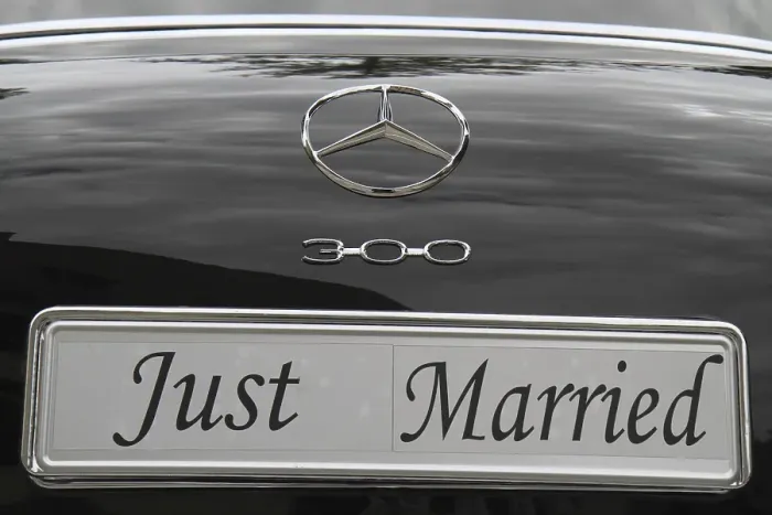 Framed Print : Just Married licence plate on the back of a vintage black Mercedes Benz 300 car'Just Married licence plate