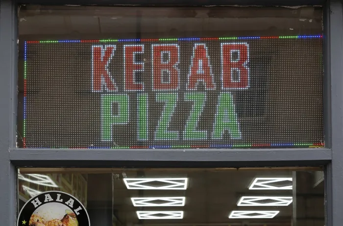 Framed Print : Kebab Pizza fast food electronic LED sign, UK