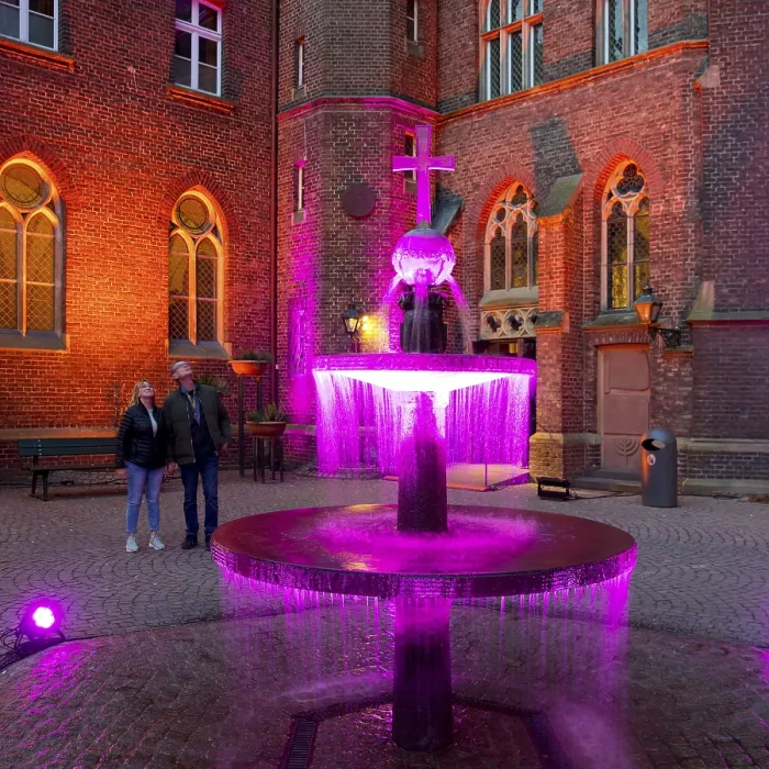 Framed Print : Kevelaer in the light, light installation inner courtyard of the confessional chapel with fountain in the evening