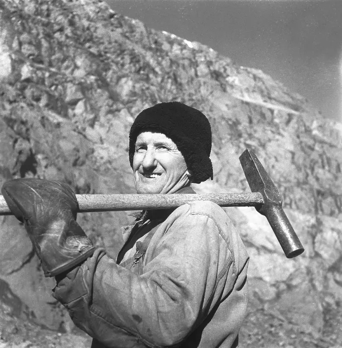 Framed Print : Kiruna Sweden in the 1950s. The open mine and a miners with tools on their shoulders Framed Print : Kiruna Sweden in the 1950s. The open mine and a miners with tools on their shoulders