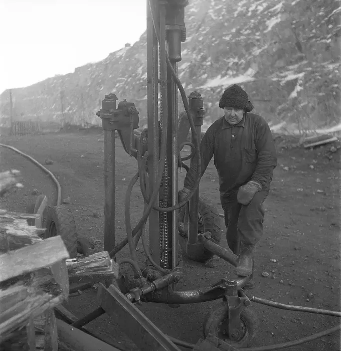 Framed Print : Kiruna Sweden in the 1950s. The open mine and workers drilling holes to put explosives