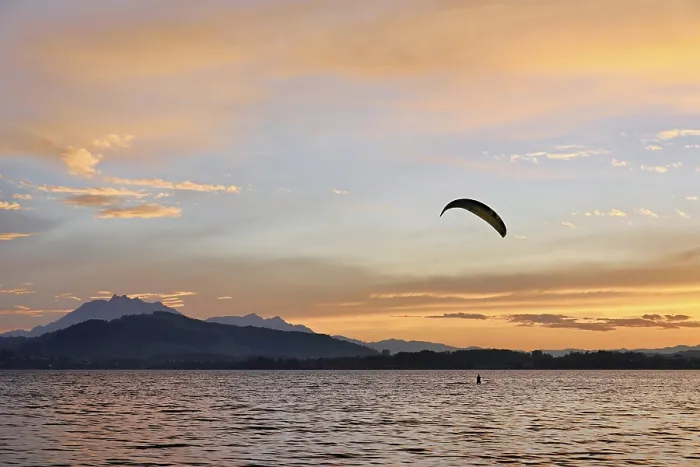 Framed Print : Kitesurfer on Lake Zug at sunset
