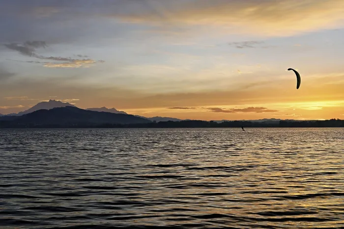 Framed Print : Kitesurfer on Lake Zug at sunset