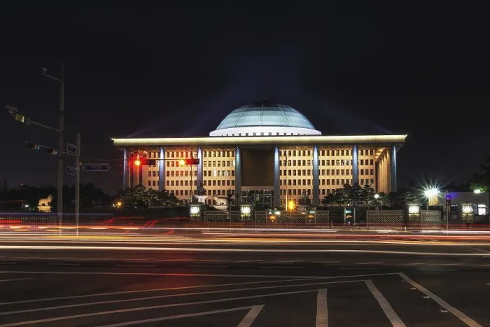 Framed Print : Korean natinoal assembly hall taken at night with the oncoming traffic and cars