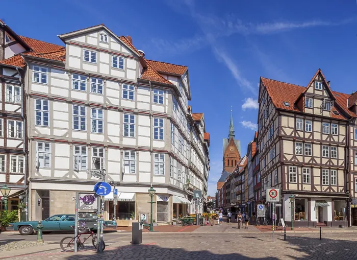 Framed Print : KramerstraBe with half-timbered houses and the market church in the historic old town