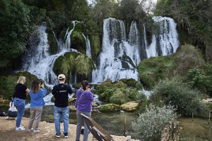 Framed Print : Kravica waterfalls, tourists photographing the waterfall Framed Print : Kravica waterfalls, tourists photographing the waterfall