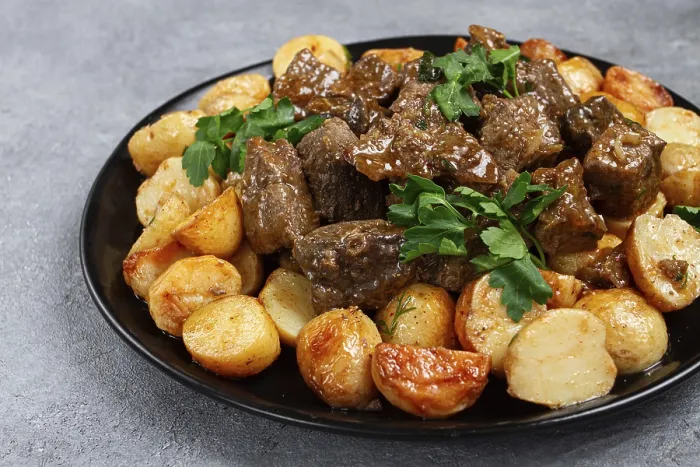 Framed Print : Kuyrdak, roast offal with potatoes and fresh herbs