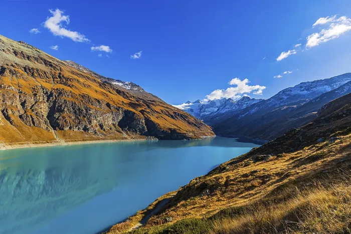 Framed Print : Lac de Moiry, in the background the peaks of the Grand Cornier