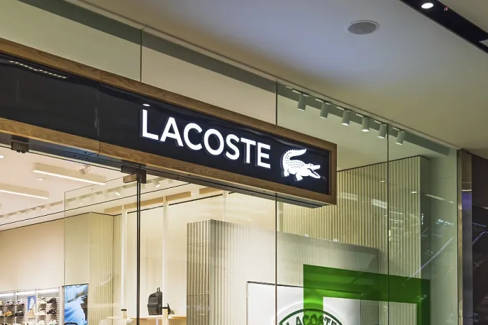 Framed Print : Lacoste clothing store entrance in a shopping mall