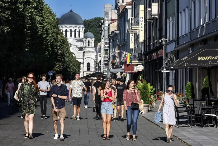 Framed Print : Laisves aleja in Kaunas with passers-by and the Church of Archangel Michael in the background Framed Print : Laisves aleja in Kaunas with passers-by and the Church of Archangel Michael in the background