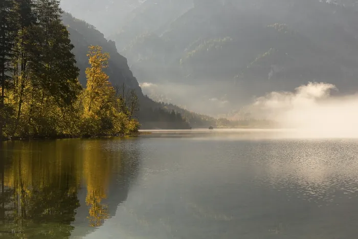 Framed Print : Lake Almsee in autumn with a forest reflected in the lake