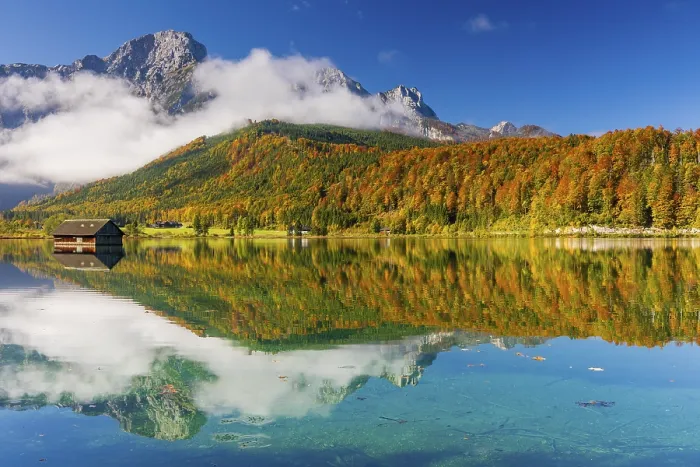 Framed Print : Lake Almsee in autumn with a forest reflected in the lake
