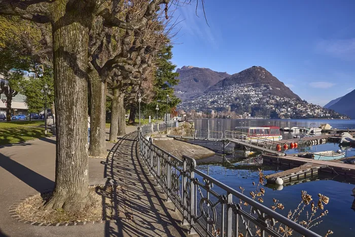 Framed Print : Lakeside promenade, railing with shade