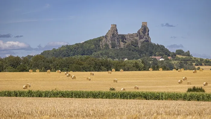 Framed Print : Landscape with castle ruins in the background and straw bales in the field Framed Print : Landscape with castle ruins in the background and straw bales in the field
