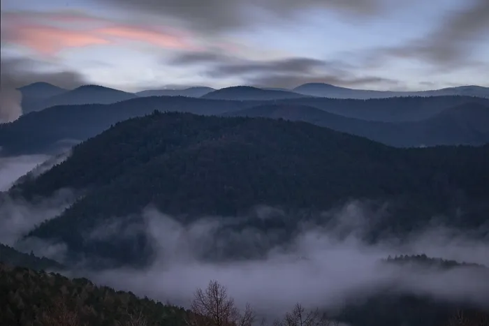 Framed Print : Landscape shot with cloudy sky and fog in the valley Framed Print : Landscape shot with cloudy sky and fog in the valley