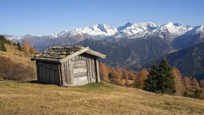 Framed Print : Larch meadows in autumn, with hay barn