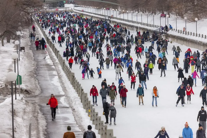 Framed Print : A large crowd ice-skating on a snowy day Framed Print : A large crowd ice-skating on a snowy day