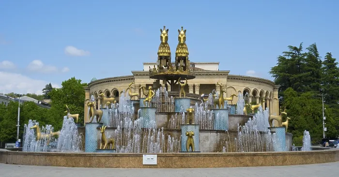Framed Print : Large fountain with golden statues in an architectural and green setting Framed Print : Large fountain with golden statues in an architectural and green setting