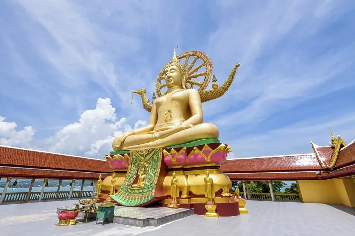 Framed Print : Large gold buddha statue in a sitting position under the blue sky at Big Buddha Temple is a famous tourist destination Framed Print : Large gold buddha statue in a sitting position under the blue sky at Big Buddha Temple is a famous tourist destination
