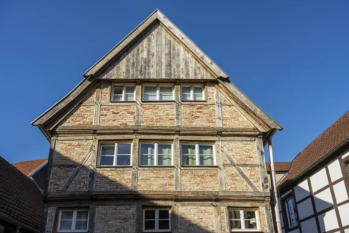 Framed Print : Large half-timbered house under a blue sky Framed Print : Large half-timbered house under a blue sky