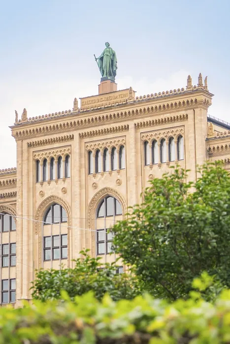 Framed Print : Large historic building with statue on the roof