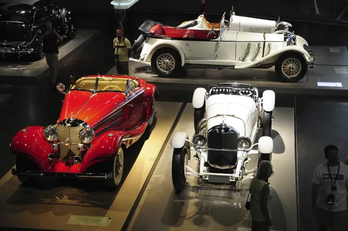 Framed Print : Large number of restored classic cars on display in a museum