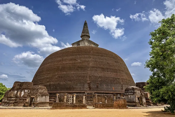 Framed Print : Large stupa under a cloudy sky with surrounding ancient walls Framed Print : Large stupa under a cloudy sky with surrounding ancient walls